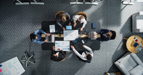 Top,Down,View:,Diverse,Professionals,Working,On,Business,Statistics,Reports Building Your First Quality Management System