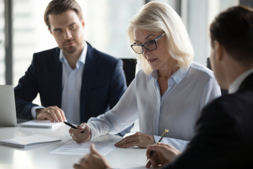 Businessmen,Sitting,At,Desk,Headed,By,Middle,Aged,Serious,Concentrated FDA Audit Readiness: A 5-Step Guide for 2026 | cGMP Consulting