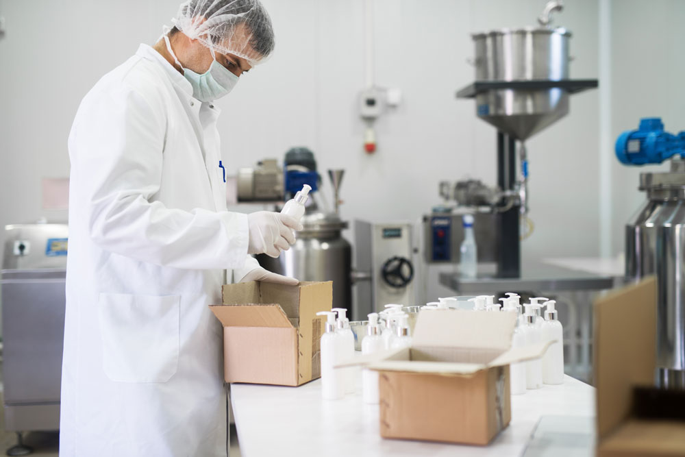 Cosmetics packaging lab working packaging lotion bottles